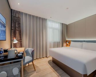 Home Inn Nanjing Yueyahu Yinchengdongyuan - נאנז'ינג - חדר שינה