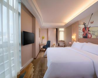 Vienna Hotel Shenzhen Buji Metro Station - Shenzhen - Habitación