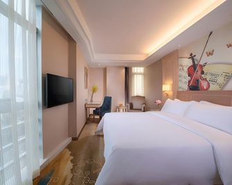 Vienna Hotel Shenzhen Buji Metro Station - Shenzhen - Habitación
