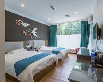 Huiyin Hotel - Guangzhou - גואנגג'ואו - חדר שינה