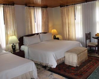 Hotel California X Sunset Farm Hotel - Pacho - Bedroom