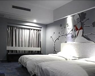 Design Boutique Hotel - Huangshan - הואנגשאן - חדר שינה