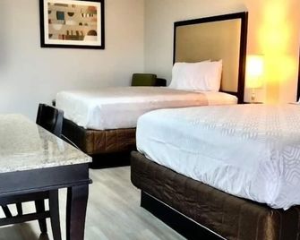 Budget Inn - Denison - Ložnice