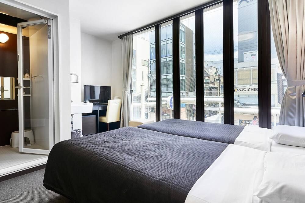 إيزوتسو هوتل كيوتو كاواراماتشي سانجو