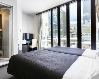 إيزوتسو هوتل كيوتو كاواراماتشي سانجو - كيوتو - غرفة نوم