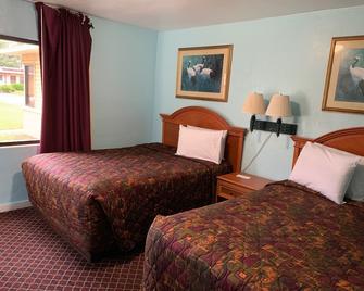 Travel Inn Daytona - Biển Daytona - Phòng ngủ