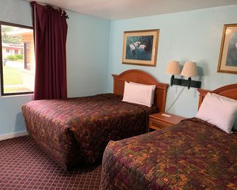 Travel Inn Daytona - Daytona Beach - Schlafzimmer