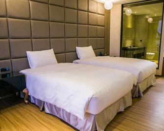 Sun Hao International Hotel - Douliu - Slaapkamer