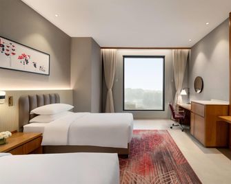 Ramada by Wyndham Ranchi Bariatu Road - ראנצ'י - חדר שינה