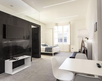 نوستوس رومز آند أبارتمنتس - سرقوسة - غرفة نوم