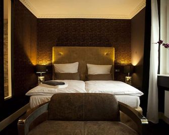 Boutique-Hotel Georges - אסן - חדר שינה