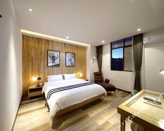 Jianwai Boutique Hostel (Haikou Qilou Old Street) - Haikou - Habitación