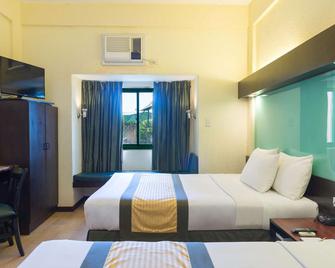 Microtel by Wyndham Cabanatuan - Cabanatuan City - Bedroom