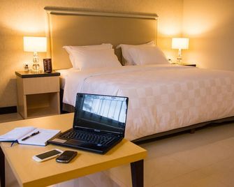 Bella Hotel Surabaya - סוראבאיה - חדר שינה