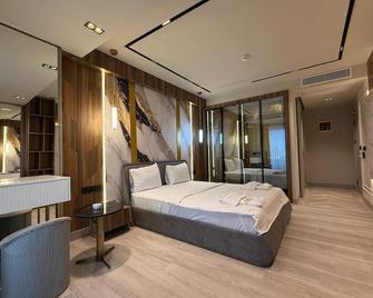 Golden Stone Hotel Akçay - Edremit - Schlafzimmer