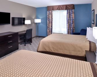 Americas Best Value Inn & Suites Southaven Memphis - Horn Lake - Schlafzimmer