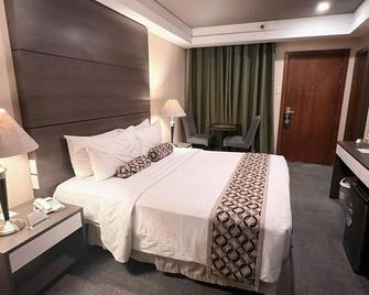 88 Courtyard Hotel - מנילה - חדר שינה