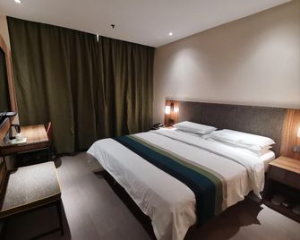 Motel Langfang High-speed Railway Station Xinchaoyang Shopping Center - Langfang - Camera da letto