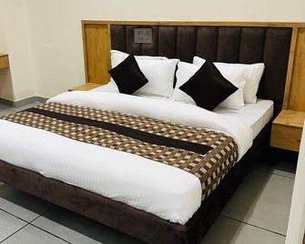 Hotel Bleu Ville - Faridabad - Schlafzimmer