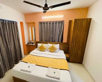 Hotel Habitat Inn - Pune - Пуна - Спальня