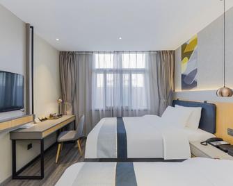 Home Inn Style Golden Nanjing Jiangpu Longhua Road Metro Station - Nanjing - Soveværelse