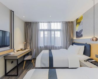 Home Inn Style Golden Nanjing Jiangpu Longhua Road Metro Station - נאנז'ינג - חדר שינה