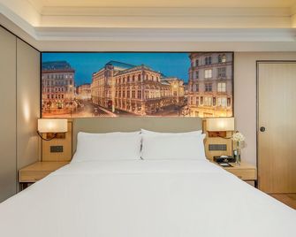 Vienna International Hotel Guangzhou Railway Station Sanyuanli Metro Station - Guangzhou - Bedroom