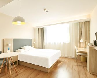 Hanting Hotel Qingdao Hai'er Road - تشينغداو - غرفة نوم