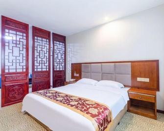 Jialong Hotel (Guangyuan High-speed Railway Station) - Guangyuan - Schlafzimmer
