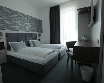 Hotel Starton am Village - Ingolstadt - Schlafzimmer
