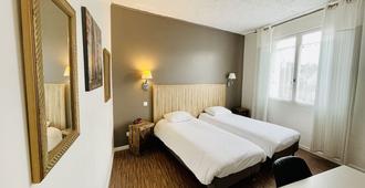 Hotel Italia - Tours - Schlafzimmer