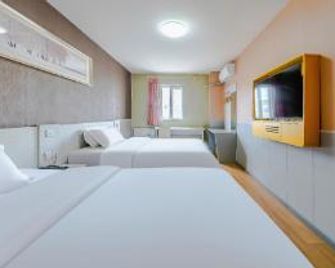 7Days Inn Qingdao Haiyunan Xinglong Road - Qingdao - Bedroom