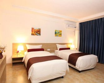 Golden Hot Spa Hotel - Dandong - Schlafzimmer