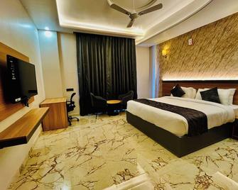 The Grand Oasis Hotel & Resort - Greater Noida - Slaapkamer