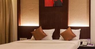 Hotel Chaitali - Pure Veg - 戈爾哈布爾 - 臥室