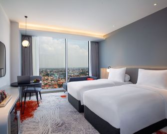 Harris Hotel & Convention Cibinong City Mall Bogor - Bogor - Slaapkamer
