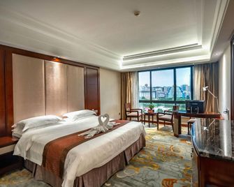 Chenzhou Tianmingdi Holiday Hotel - Chenzhou - Slaapkamer
