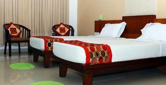Hotel Soorya Regency - Malappuram - Bedroom