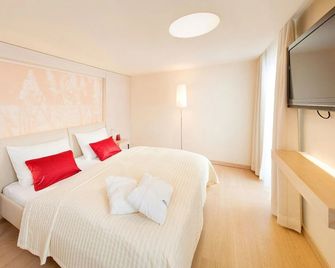 Strandhotel am Weissensee - וייסנזי - חדר שינה