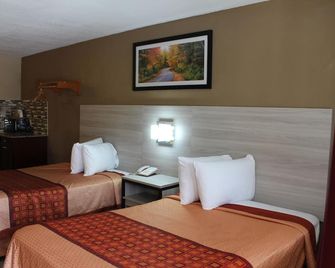 Travel Inn & Suites Flemington - Flemington - Schlafzimmer