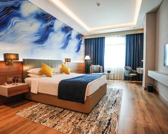 موڤنبيك جراند البستان دبي - دبي - غرفة نوم