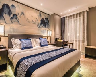 Rezen Dong Hotel (Harbin Railway Station) - Harbin - Yatak Odası