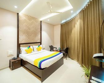 Itsy Hotels Sitara - Sātāra - Bedroom