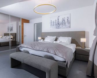 Visimo Apartments Flims With Private Sauna - Flims - Bedroom