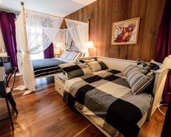 RoomQuest Rimrabeang at Amphawa - Amphawa - Schlafzimmer
