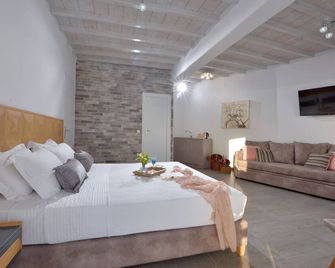 Junior Suite with Sea View - Agios Stefanos - Bedroom