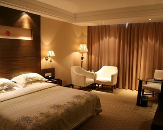 Seaside Goldenshine Hotel - Wej-fang - Ložnice