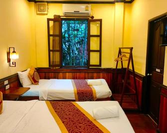 Lotus Corner Vegan and Plant-Based B&B - Luang Prabang - Κρεβατοκάμαρα