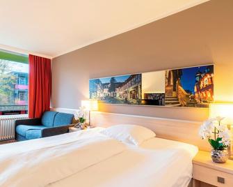 H+ Hotel Goslar - Goslar - Κρεβατοκάμαρα