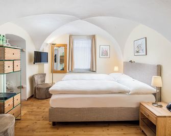 Boutique Hotel Engadinerhof - A Home for Generations - פונטרסינה - חדר שינה
